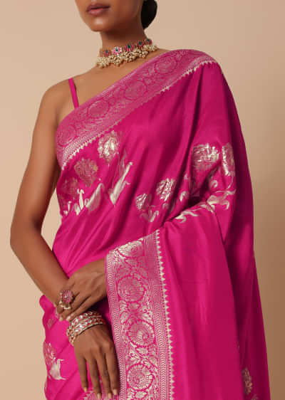 Rani Pink Banarasi Silk Saree With Floral Motif Pallu And Unstitched Blouse Piece