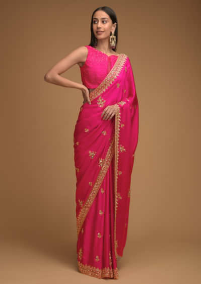 Rani Pink Saree In Satin With Hand Embroidered Floral Buttis Using Cut Dana And Sequins Work Along With Unstitched Blouse  