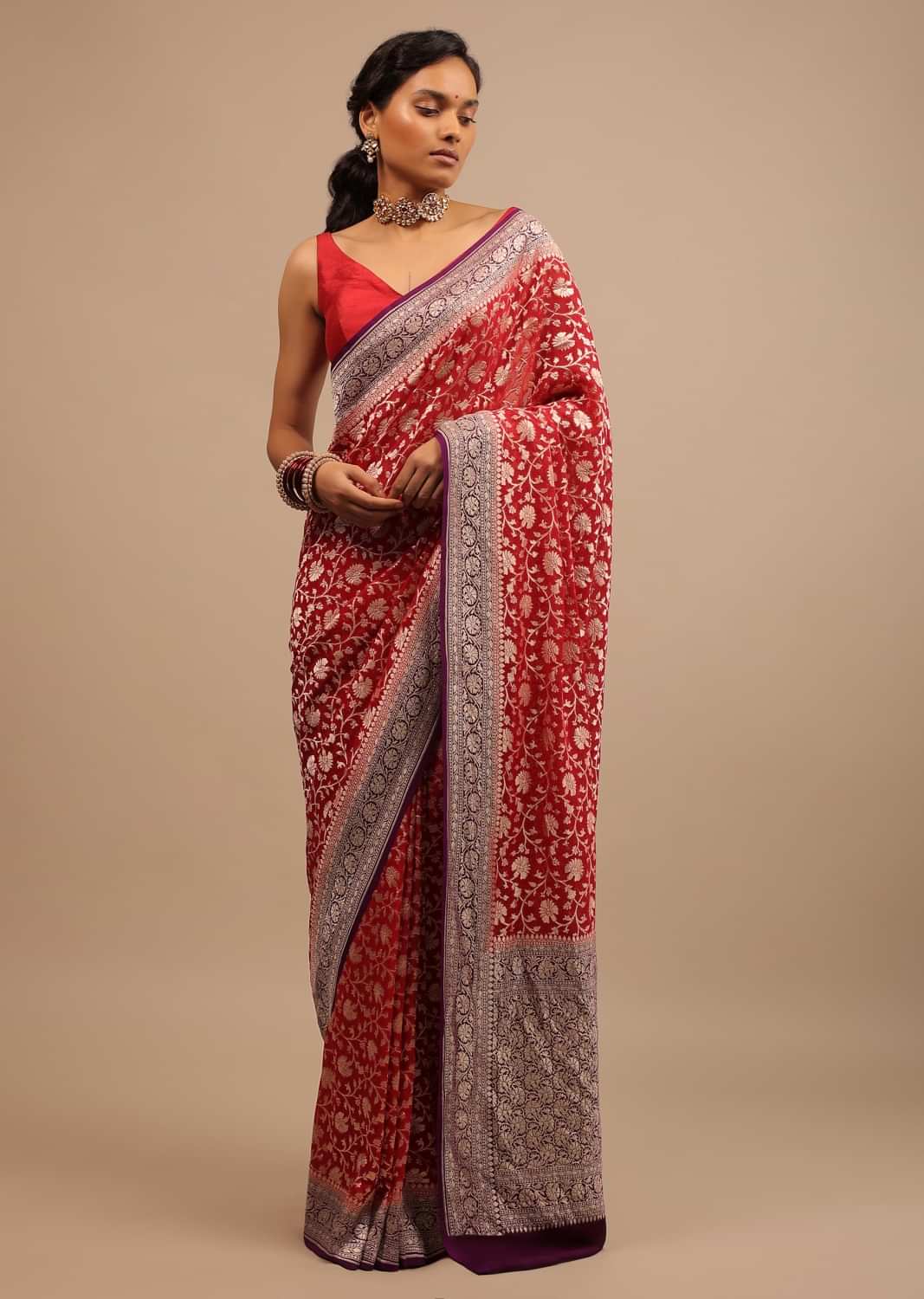 Red Saree In Georgette With Contrasting Wine Border And Woven Floral Jaal Work