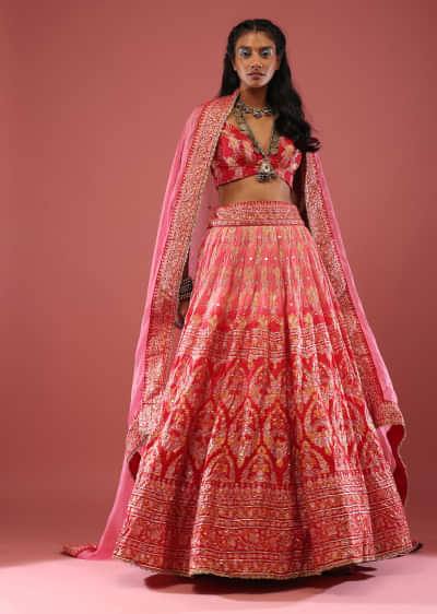 Red Silk Lehenga With Varied Embroideries And Foil Print Is Matched With An Organza Dupatta