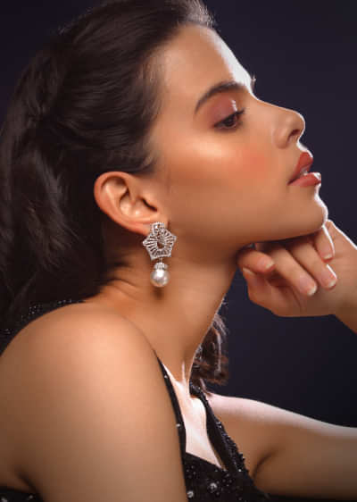 Silver Stud Earrings With Swarovski Studded Pentagon And Dangling Pearl 