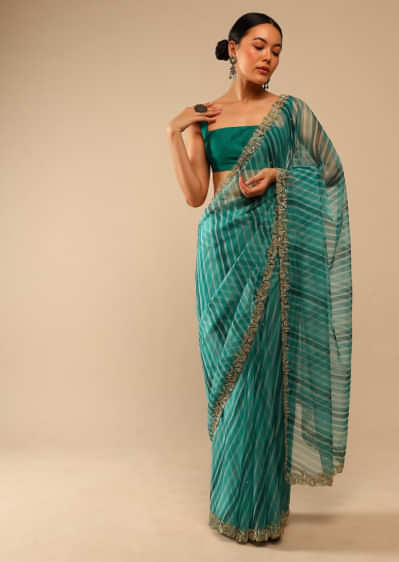 Teal Green Saree In Organza With Lehariya Print And Hand Embroidered Border With Beads And Sequins Work  