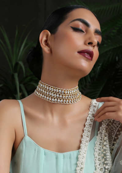 White And Gold Necklace With Four Rows Of Pearls Arranged In Symmetry Between Hexagon Shaped Kundan By Paisley Pop
