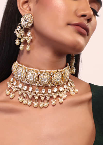 Gold Plated Choker Set With Kundan Work In Floral Design With Dangling Pearl Fringes