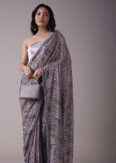 Lavender Purple Sequins Saree With An Embellished Border