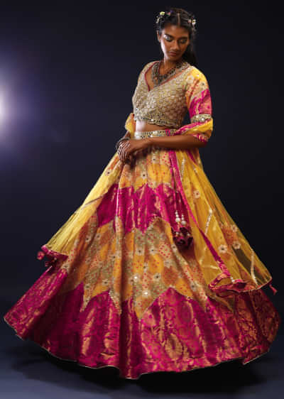 Yellow And Magenta Lehenga Choli With Floral Brocade And Bandhani Along With Mirror Accents